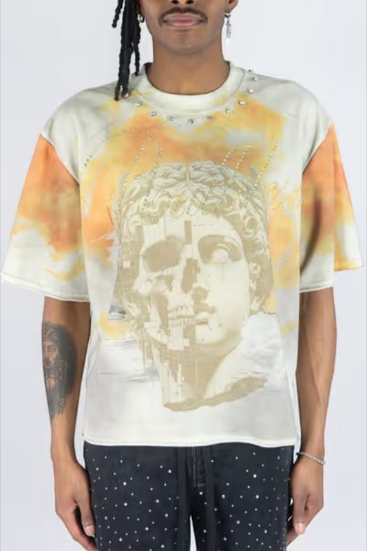 Rebel Minds Greek God t-shirt in cotton-poly terry with digital skull statue print, rhinestones, and orange accents.