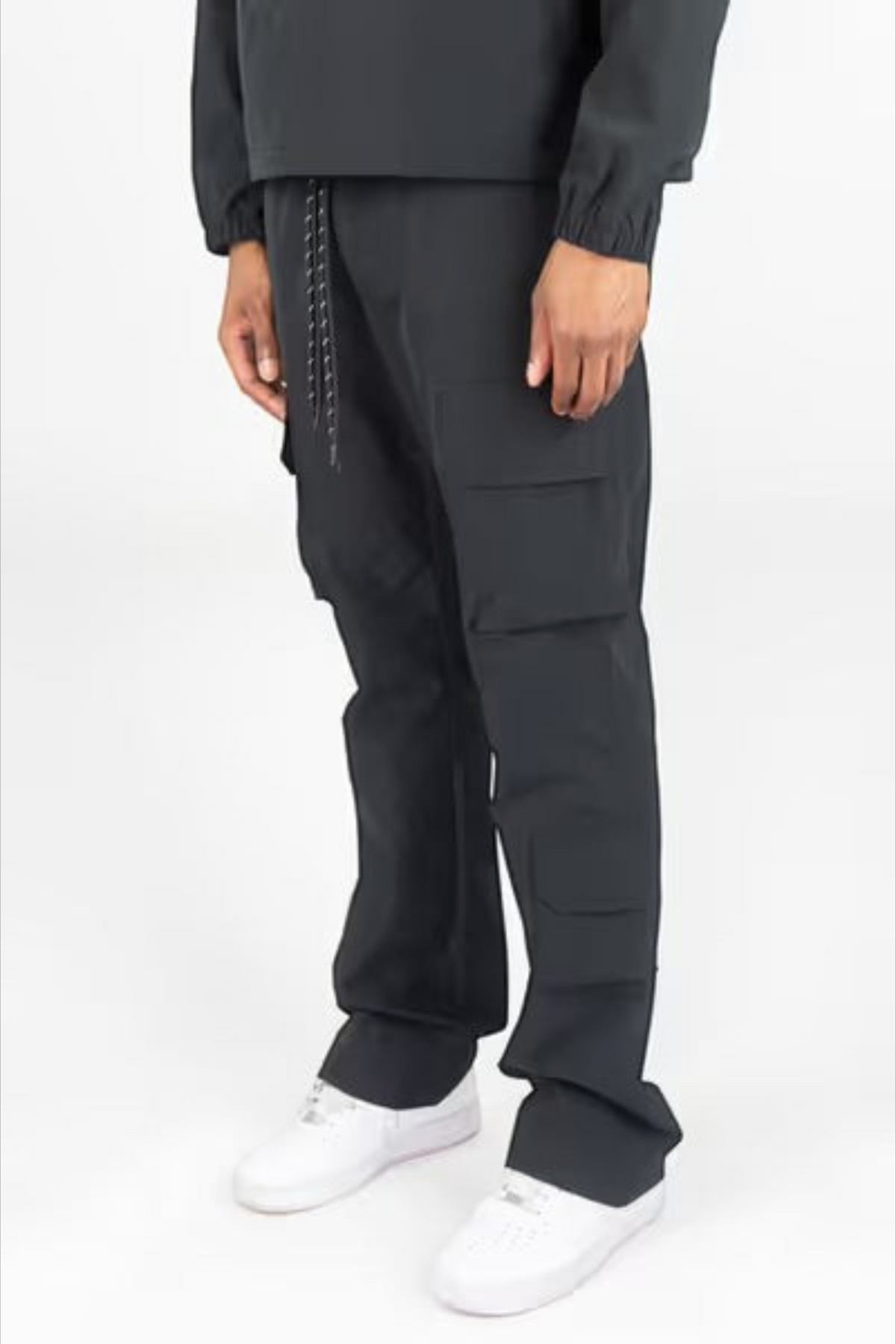 Rebel Minds black midweight ripstop flare-fit pants with cargo pockets and drawstring waist worn by a model