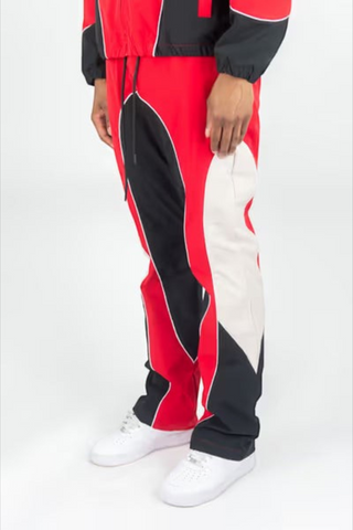 Rebel Minds red, black, and white color-blocked ripstop windbreaker pants with flare-fit design