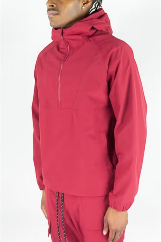 Rebel Minds 502 dark red midweight ripstop half-zip hooded anorak worn by a man, side profile view.