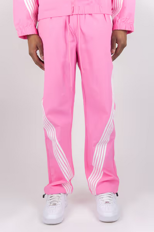 Rebel Minds pink crinkled nylon pants featuring white bent stripe detailing on the legs for a lightweight casual look