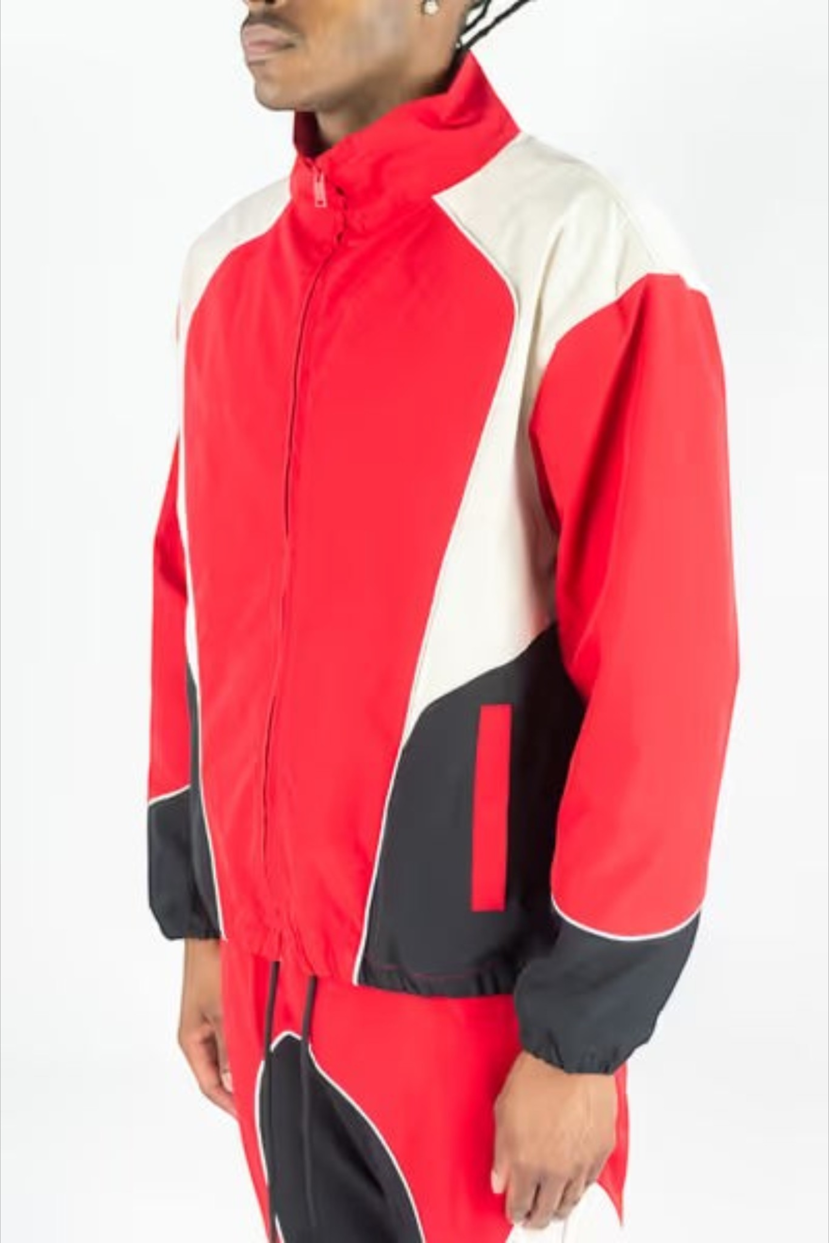 Rebel Minds red, white, and black color-blocked ripstop windbreaker jacket from the 803 set on a model