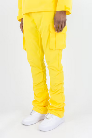 Rebel Minds 422 yellow lightweight polyester cargo pants with crinkled seams and side pockets on a model